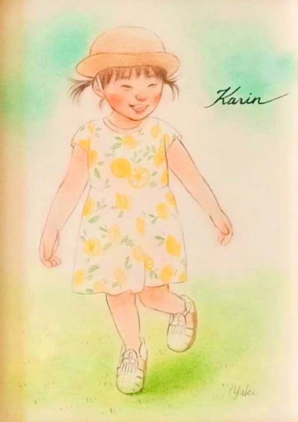 麦わら帽子と花柄のワンピースを着た子供の似顔絵